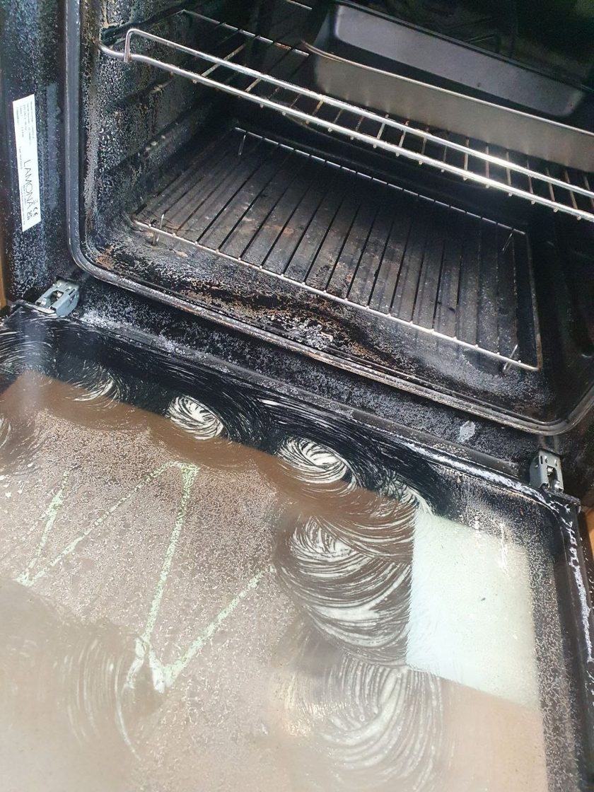 Oven interior before Domus deep clean — heavy baked-on grease
